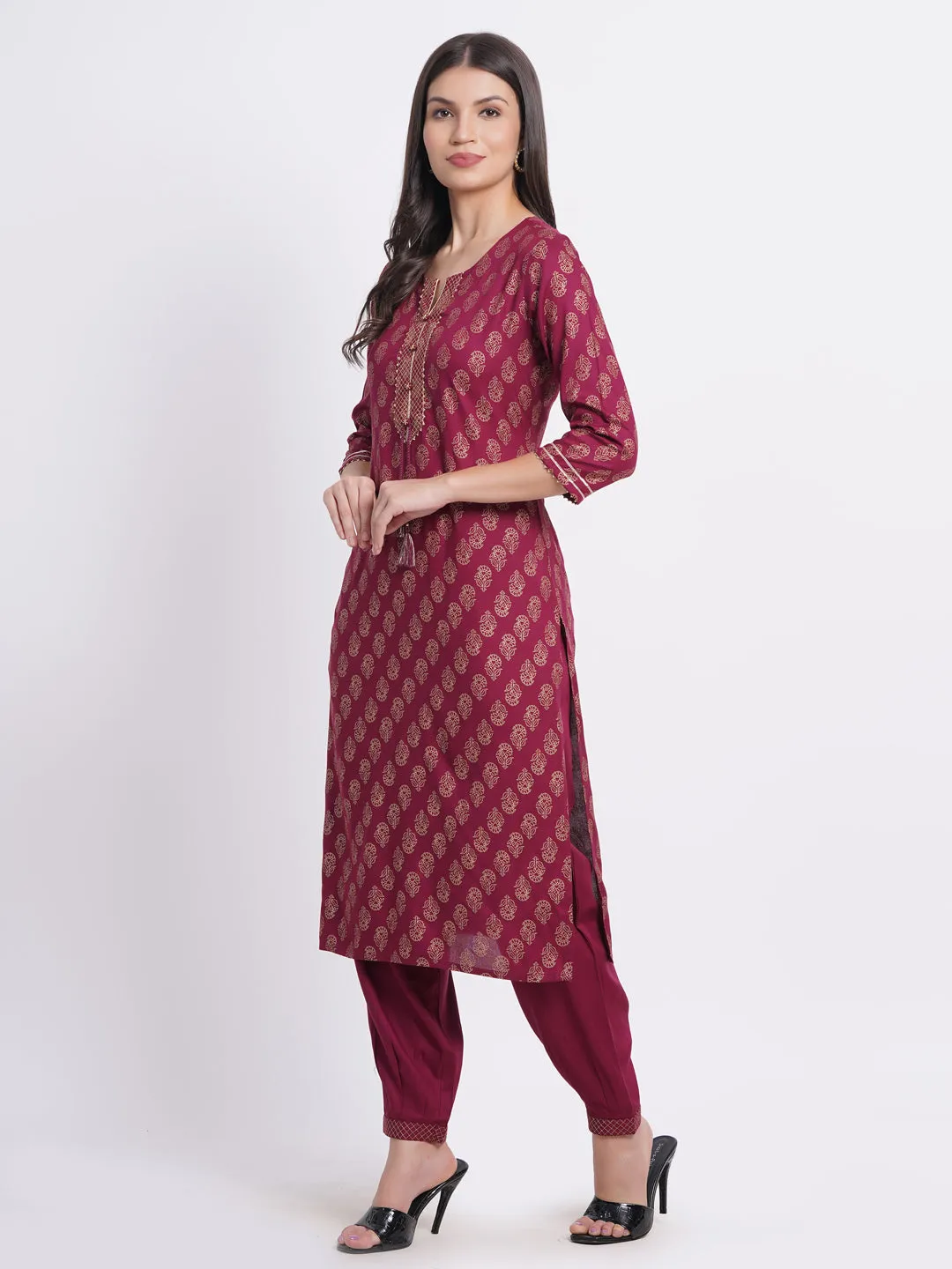 SUTI Women Elegant Gold Printed Kurta Set with Craft Button & Dori Tassels